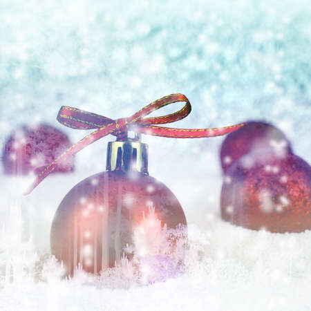 Red Christmas Ball with Bokeh in Blue MoonTone.の写真素材