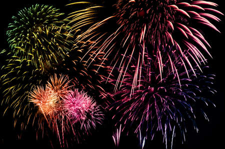 Colorful firework celebration on dark background.の写真素材