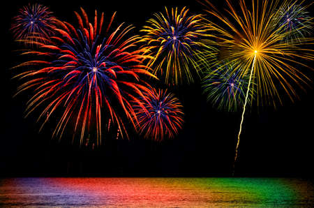 Colorful fireworks celebration on dark background.の写真素材