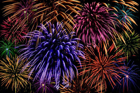 Colorful firework celebration on dark background.の写真素材