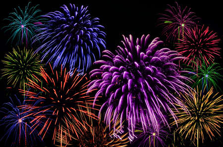 Colorful firework celebration on dark background.の写真素材