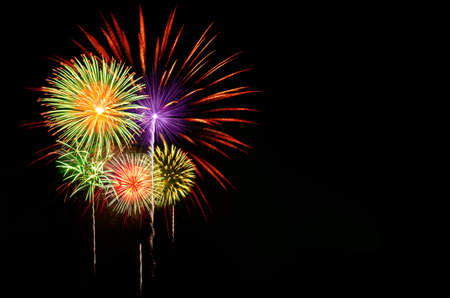 Colorful fireworks celebration on dark background.の写真素材