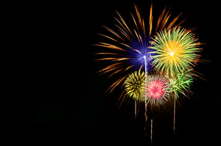 Colorful fireworks celebration on dark background.の写真素材