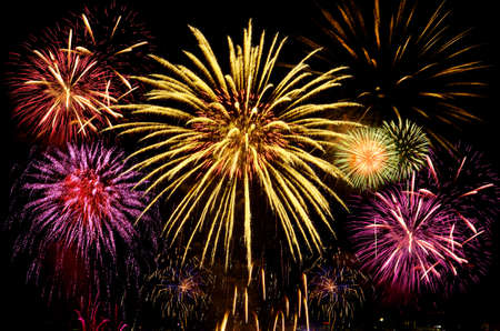 Colorful fireworks celebration on dark background.の写真素材