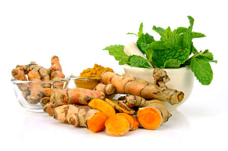 Kitchen Mint ( Mental cordifolia Opiz.),Turmeric (Curcuma longa L.) root and turmeric powder on white background.の写真素材