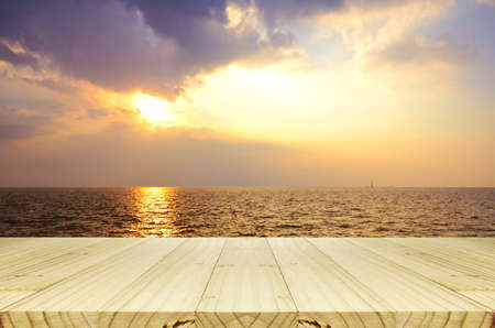 Outdoor Picnic Background with Wooden Table in the Evening Light.の写真素材