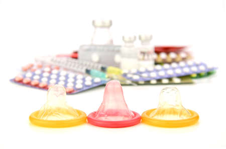 Latex Condom on White Background.の写真素材