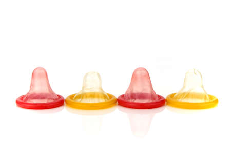 Latex Condom on White Background.