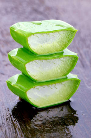 Slice Aloe Vera (Aloe barbadensis Mill.,Star cactus, Aloe, Aloin, Jafferabad or Barbados) a very useful herbal medicine for skin care and hair care.の写真素材