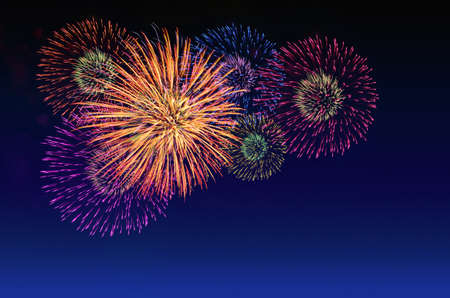 Colorful fireworks celebration and the twilight sky background.の写真素材