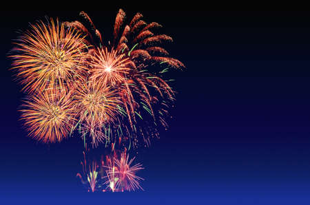 Colorful fireworks celebration and the twilight sky background.の写真素材