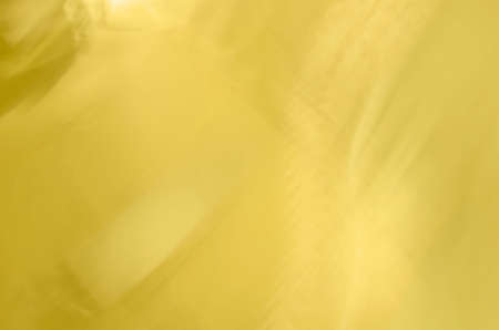 Abstract line background in light gold tone.の写真素材