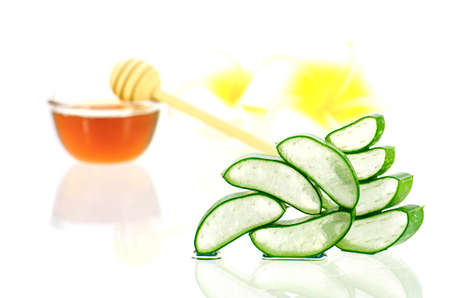 Aloe vera and honey for hair and facial treatment paste mask ingredients on white background.の写真素材