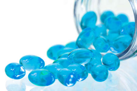 Soft gelatin capsule use in pharmaceutical manufacturing for contain oily drug and nutritional supplement like vitamin A E fish oil primrose oil rice barn oil and other oily drugs.の写真素材