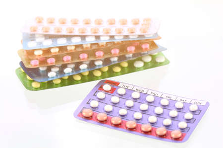 28 tablets oral contraceptive pills with oral contraceptive pills background in warm light tone.の写真素材