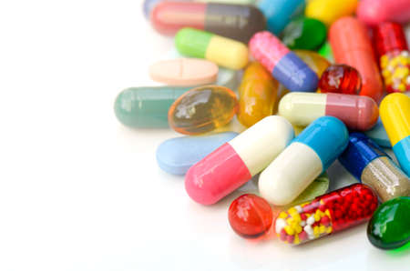 Colorful of oral medications on White Background.の写真素材