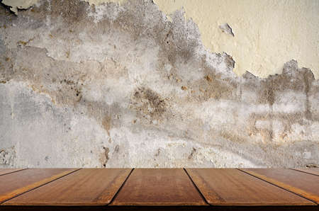 Perspective wood with grungy concrete wall. Old and deteriorate concrete wall. Grungy texture...