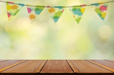 Party background with perspective wood counter and abstract background with bokeh.の写真素材