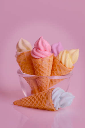 Mini ice cream cone in soft pink tone.の写真素材