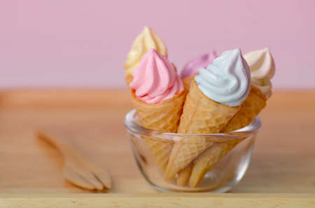 Mini ice cream cone in soft pink tone.の写真素材