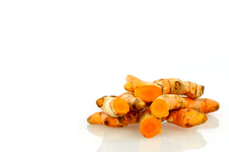 Turmeric roots on white background.の写真素材