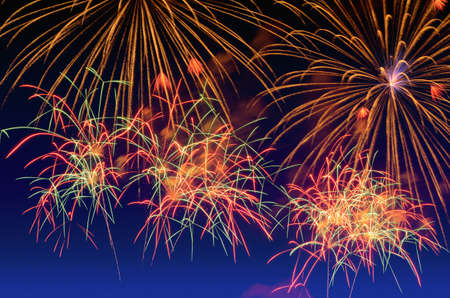 Colorful fireworks celebration and the twilight sky background.