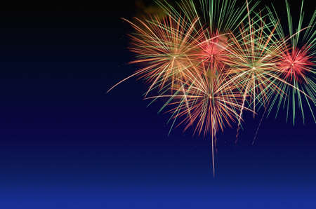 Colorful fireworks celebration and the twilight sky background.の写真素材