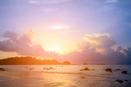 Sunset at the seaside background with strong sun light.の写真素材