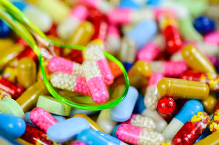 Colorful oral medication background.