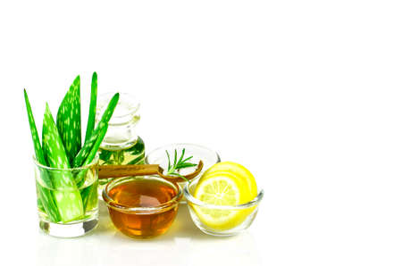 Aloe Vera, Lemon, greek yogurt, honey, rosemary, sea salt and essential oil homeopathy remedy recipe on white background.の写真素材
