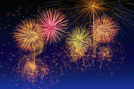 Colorful fireworks celebration and the twilight sky background.の写真素材