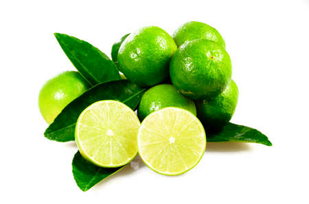 Seedless organic lime fruits (Citrus aurantifolia) isolated on white background.の写真素材