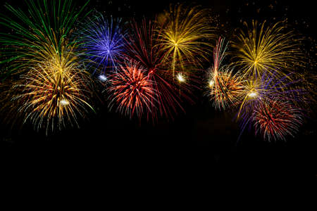 Colorful fireworks celebration and the midnight sky background.の写真素材