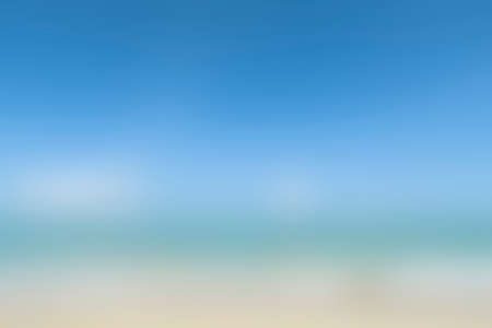 Blurred background of blue sky, emerald sea and golden beack. Blurred background with natural day tone.の写真素材