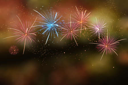 Colorful firework on bokeh light background with copy spaceの写真素材