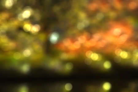 Blurred light bokeh on dark background.の写真素材