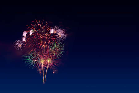 Colorful fireworks celebration and the twilight sky background.の写真素材