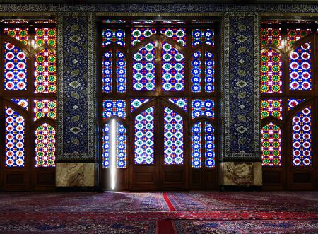 the door of an ancient mosque in iranの写真素材