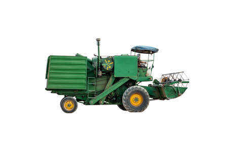 old green combine harvester isolated on white backgroundの写真素材