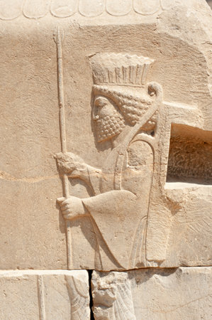 Bas relief on the wall of ruins in the Persepolis in Shiraz, Iran. The ceremonial capital of the Achaemenid Empire.の写真素材