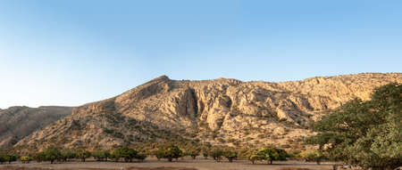 Rocky Mountains with oak trees at sunset, A panoramic view of northern Front Range mountains, leading by Longs Peak at left, on a late Summer evening. Rocky Mountain marvdasht, shiraz, Iranの写真素材