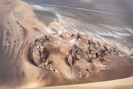 the formation of kaluts or sand stones or yardang in dasht e lut or sahara desert, iran. Nature and...