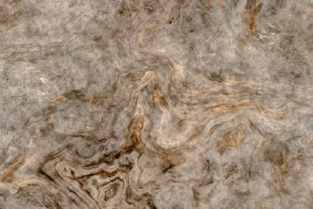 Beautiful golden curly marble texture. Abstract background.の写真素材