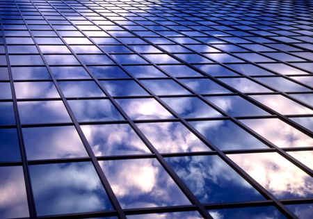 Clouds reflection on office windows