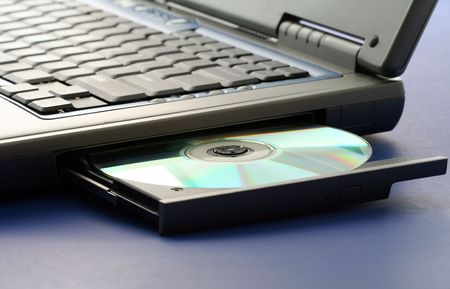 CD ROM in a laptopの写真素材