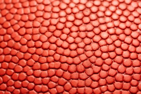 A closeup shot of a basketball textureの写真素材
