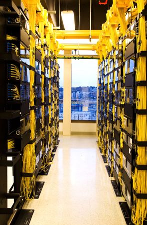 A shot of network cables and servers in a technology data center