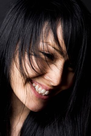 A shot of a smiling happy beautiful womanの写真素材