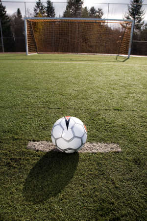 A shot of a soccer ball on a soccer fieldの写真素材