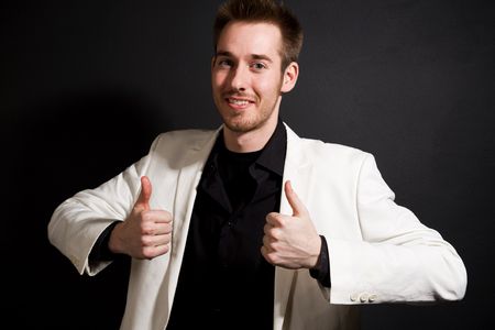 A shot of a casual caucasian businessman giving two thumbs up